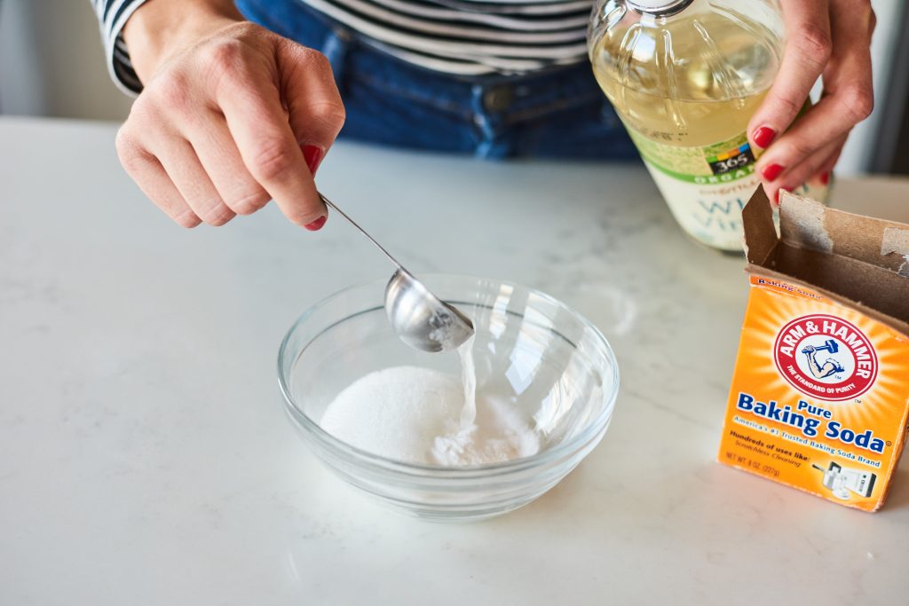 How do you get baking soda paste from a carpet?